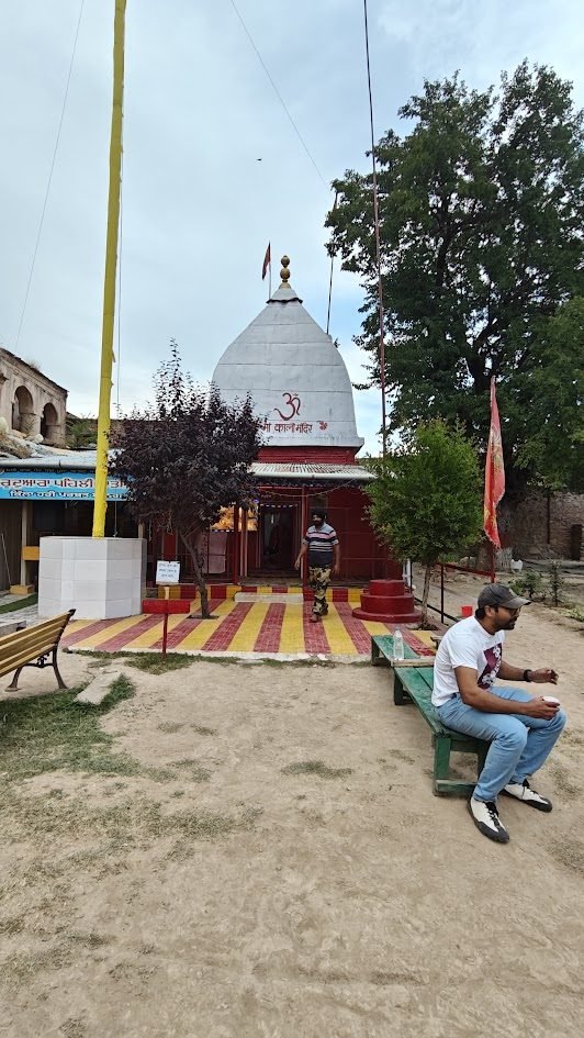 The Kali temple at Hari Parbat, Srinagar — white domed structure with saffron flags